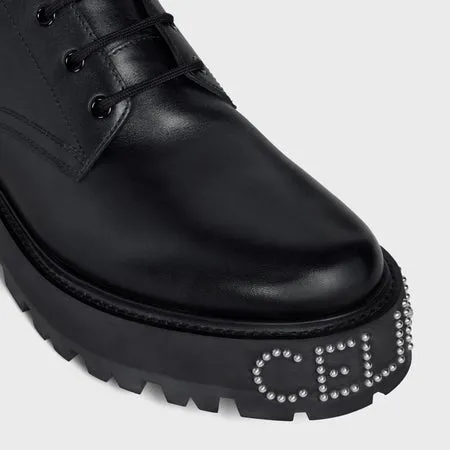 Celine Bulky Lace-Up Boot With Studded Outsole In Shiny Bull Black